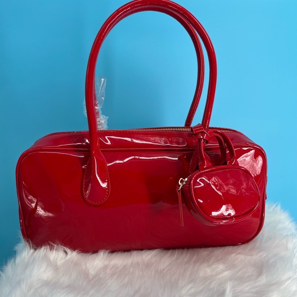 Vibrant Red Glossy Shoulder Bag with Cylindrical Design - Picture 3 of 9